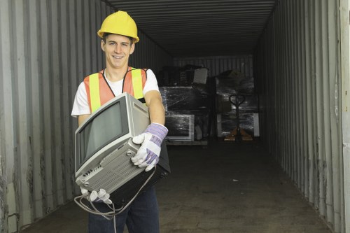 Professional team organizing garage items in Brent Cross